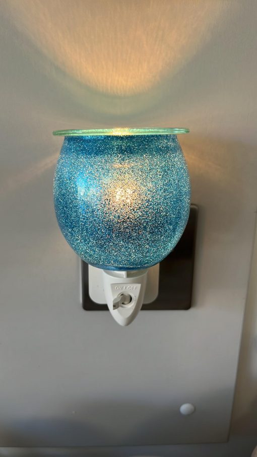 blue sparkle wax warmer plugin light on