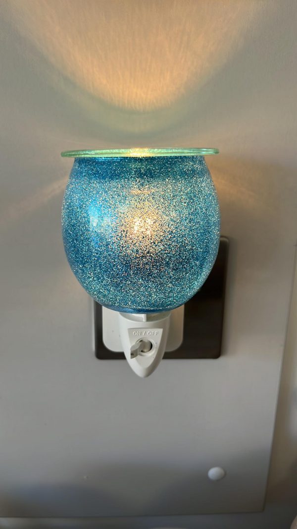 blue sparkle wax warmer plugin light on